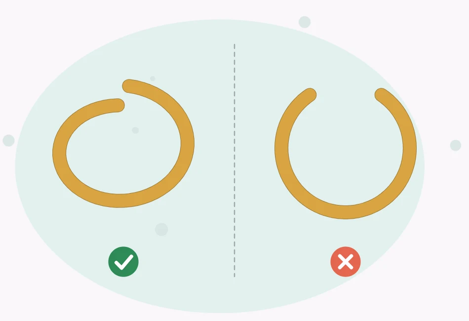 Illustration of two jump rings: one opened correctly with the ends twisted sideways past each other, and one pulled apart into a wide gap